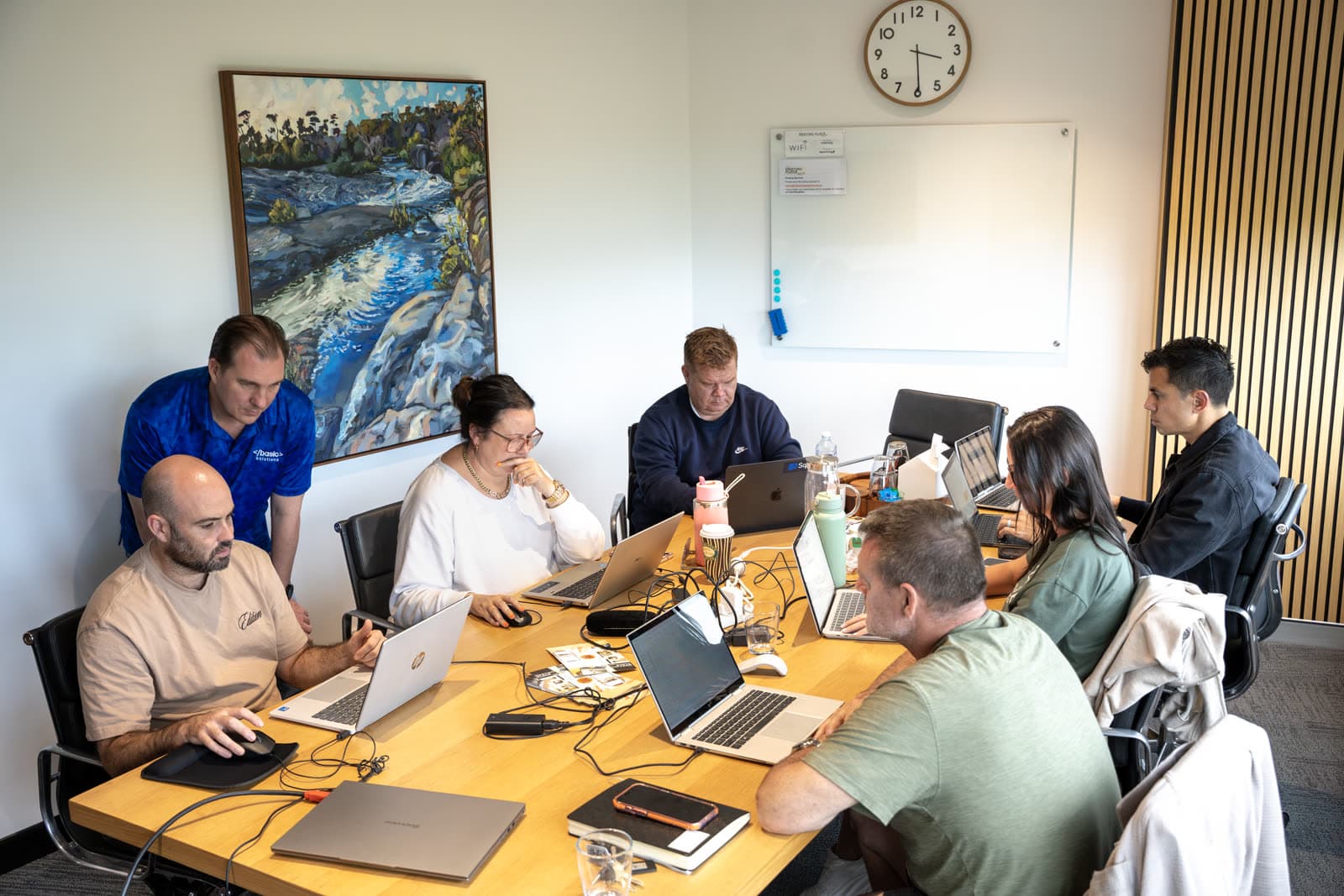 Business owners building their own AI at a Basic Solutions workshop