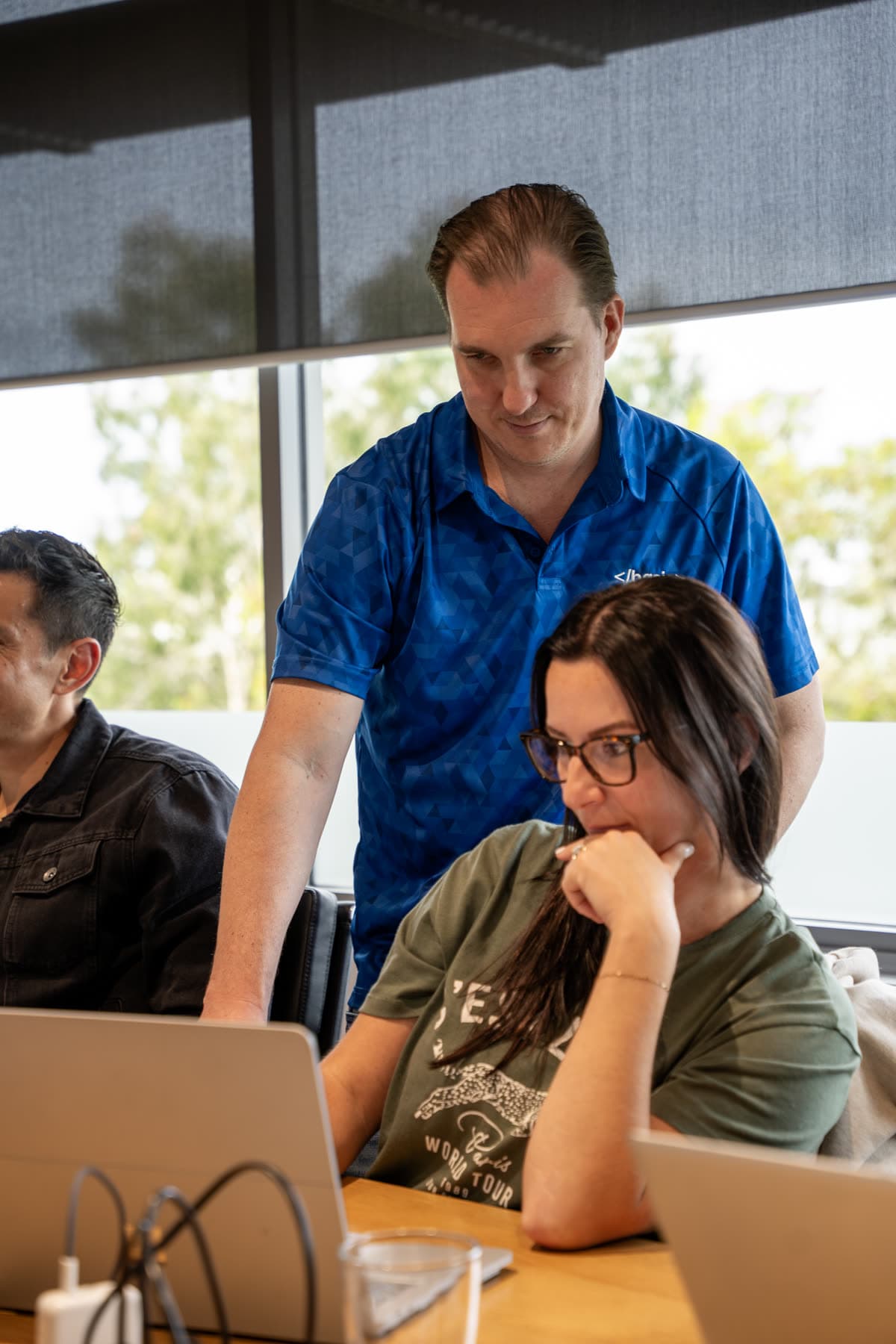 Business owners building their own AI at a Basic Solutions workshop