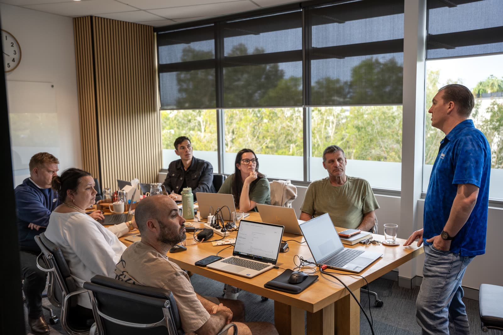 Business owners building their own AI at a Basic Solutions workshop